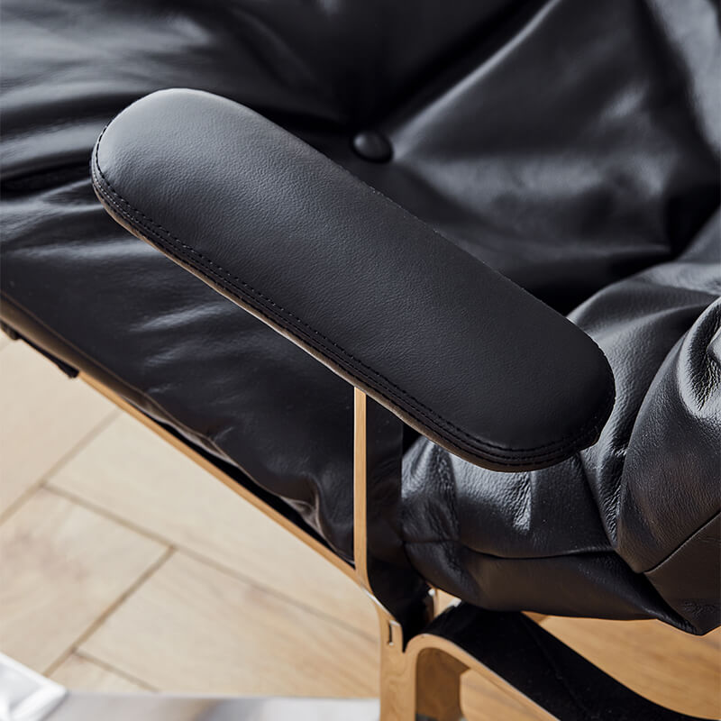 Omelette black leather lounge armchair