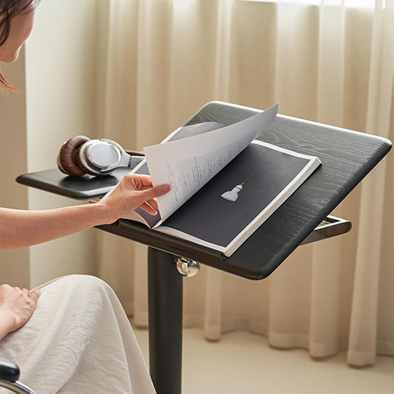 black wooden book stand for reading