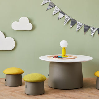 Lip kid sofa and fungo kid pouf are placed in the living room