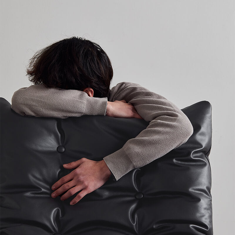 Omelette black leather lounge chair