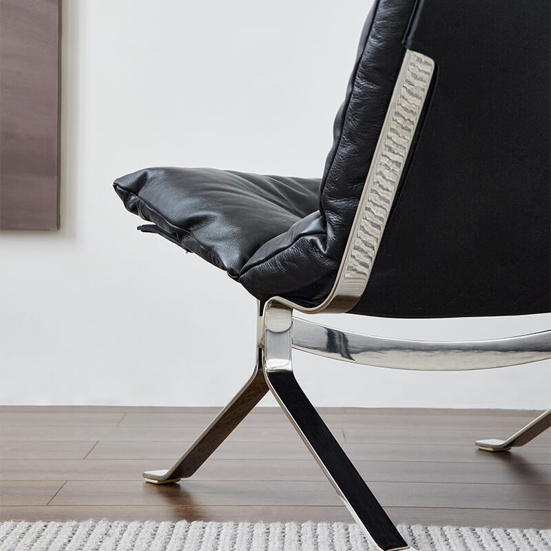 Omelette black leather lounge chair stainless steel legs