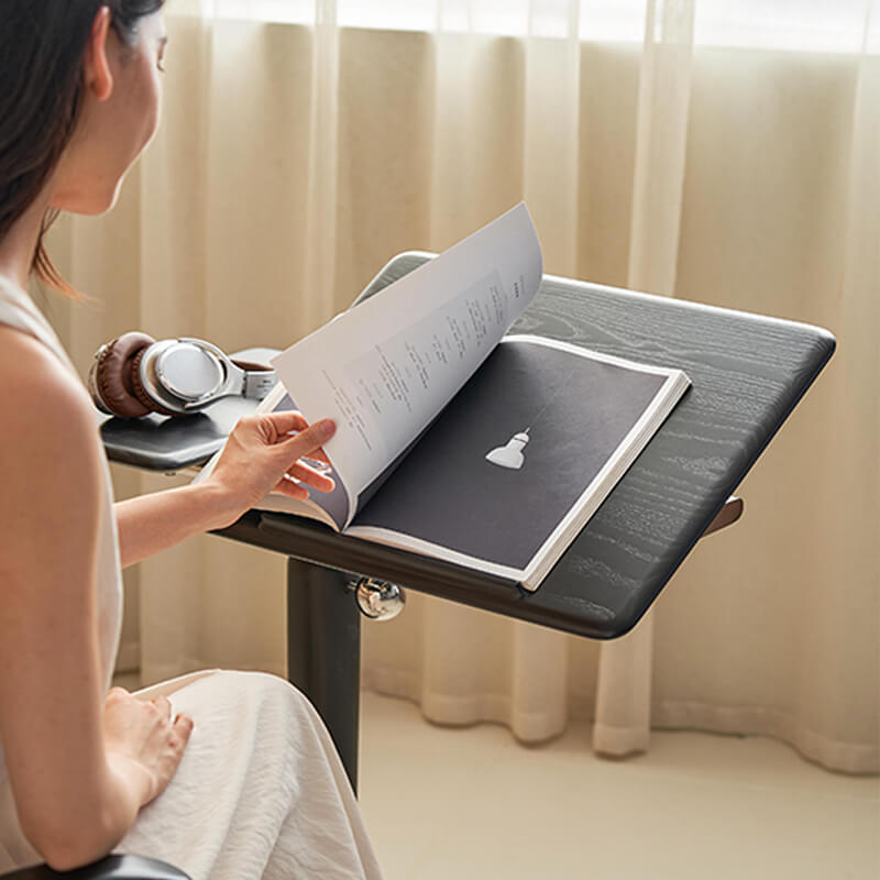 black wooden book stand for reading